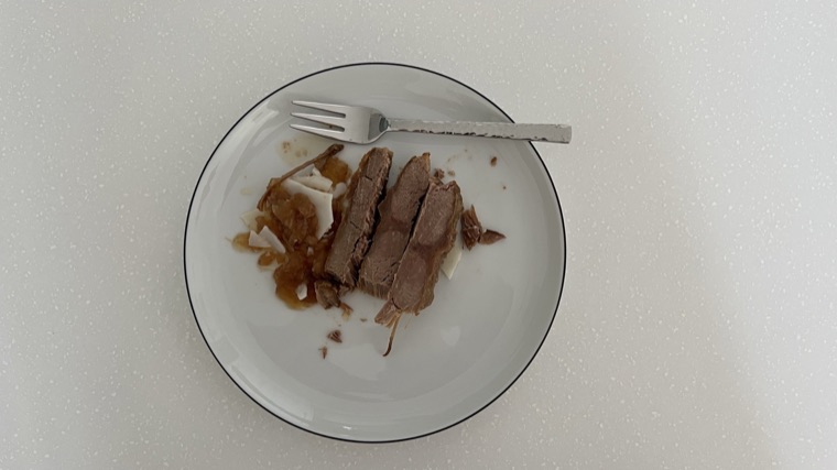 Slices of slow-roasted brisket on a plate